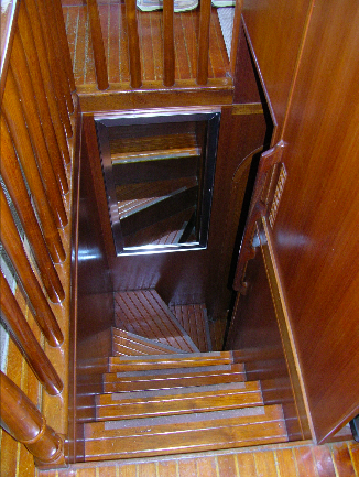 The companionway descending from the main deck.
