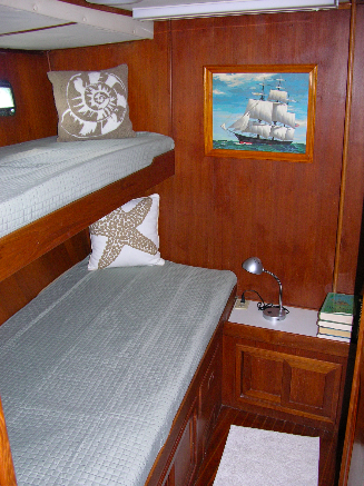The middle stateroom arranged with twin berths.