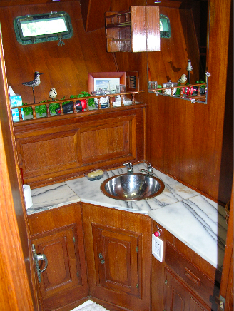 The middle head's marble-topped vanity.