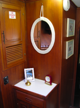 Built-in storage at the forward stateroom entrance.