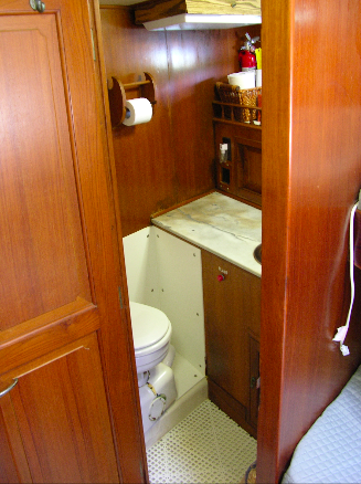 The forward head tucked beside the guest cabin.