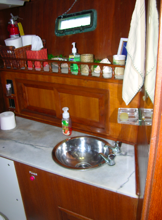 The forward head's wood-trimmed vanity.