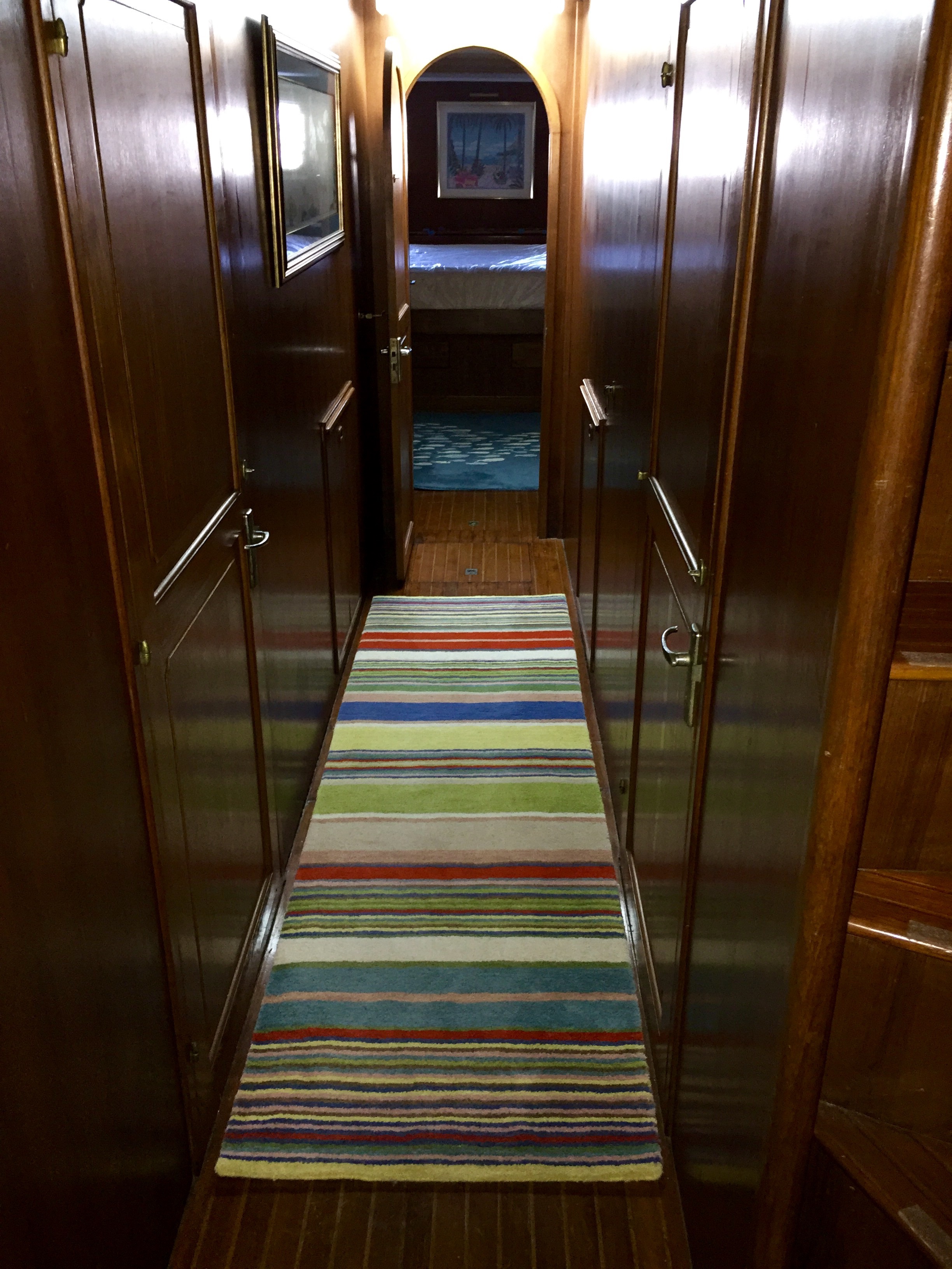 The aft passage leads toward the master stateroom.