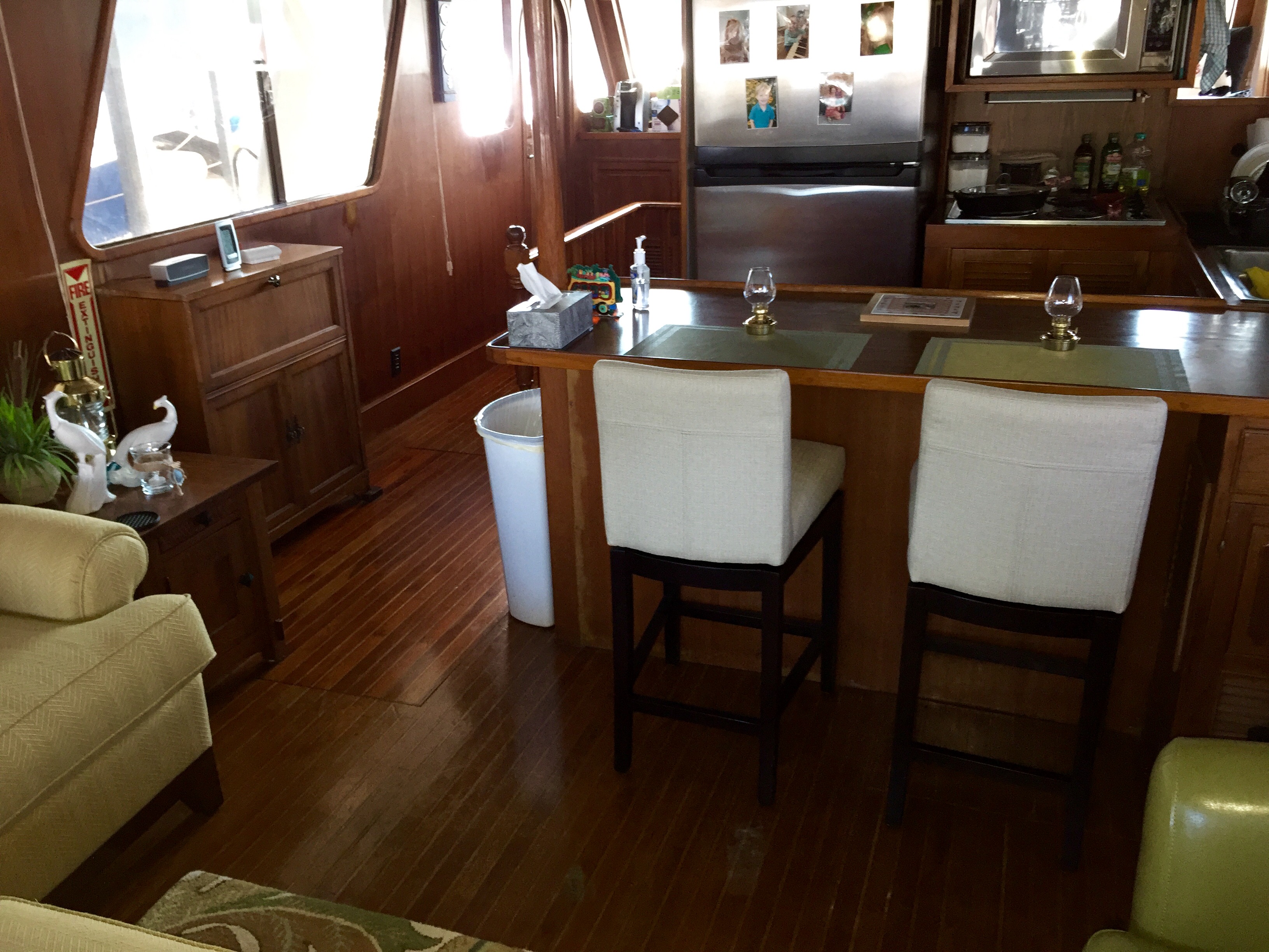 The galley and bar form one practical gathering space.