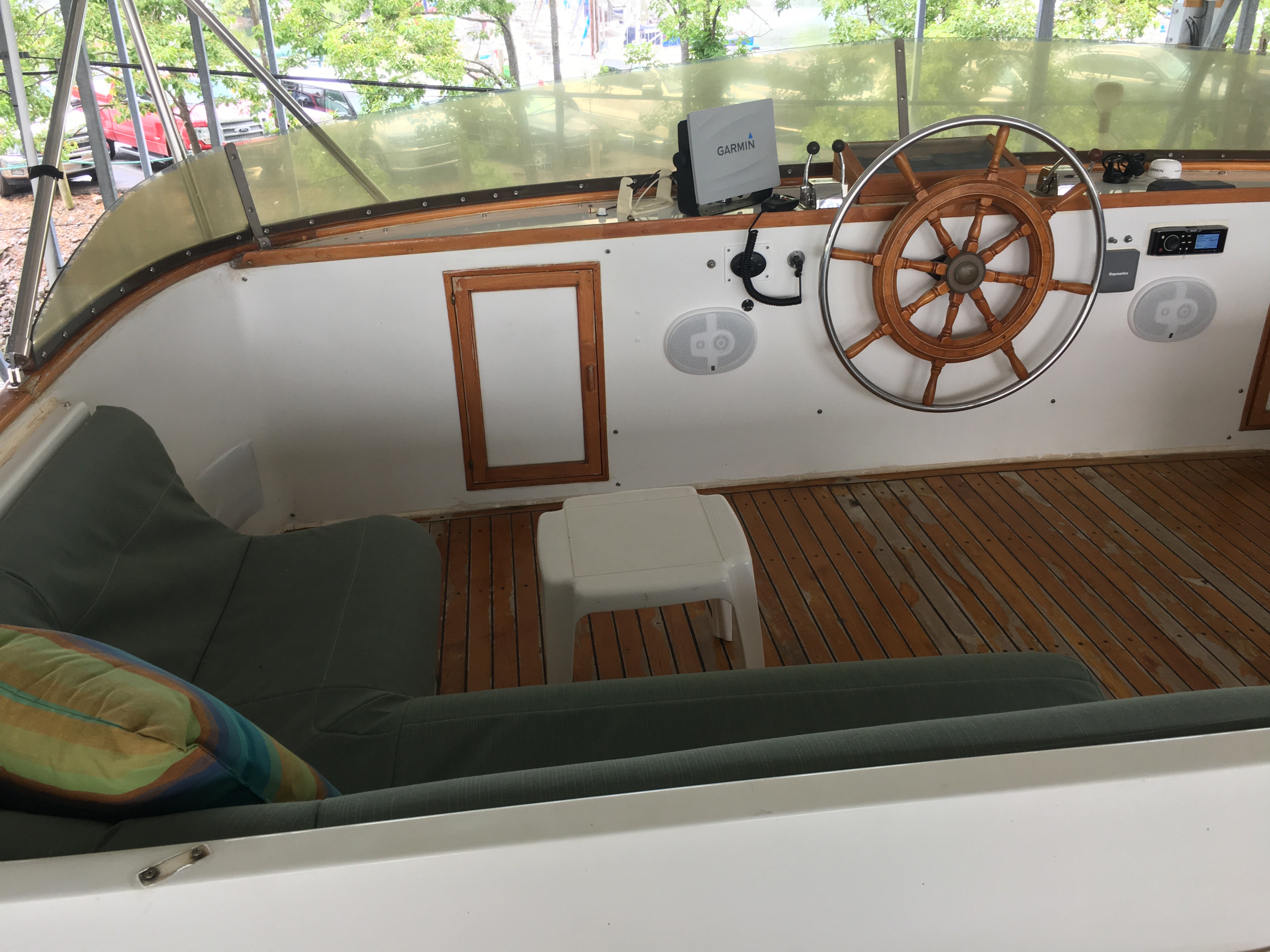 A broad view across the flybridge helm and lounge.