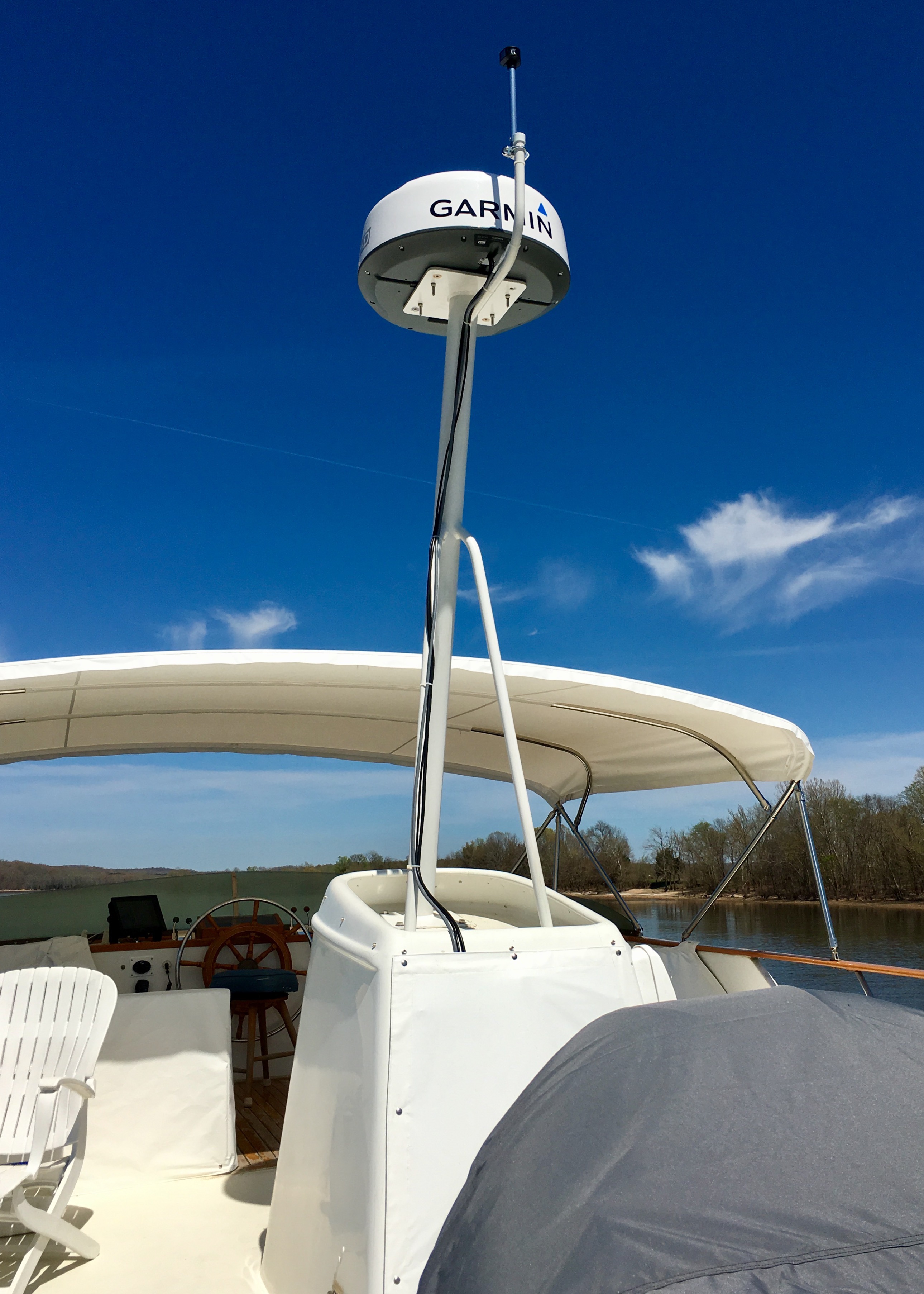 The radar tower rising above the flybridge.